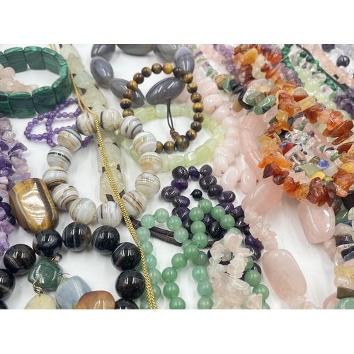 2023 - A collection of gemstone jewellery to include rose quartz, tiger's eye etc.