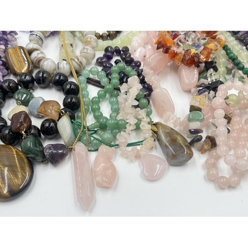 2023 - A collection of gemstone jewellery to include rose quartz, tiger's eye etc.