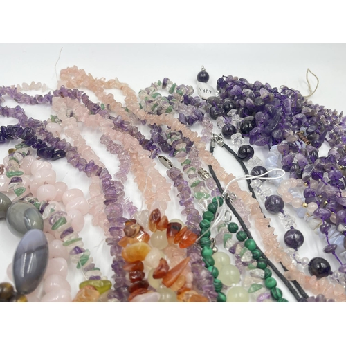 2023 - A collection of gemstone jewellery to include rose quartz, tiger's eye etc.