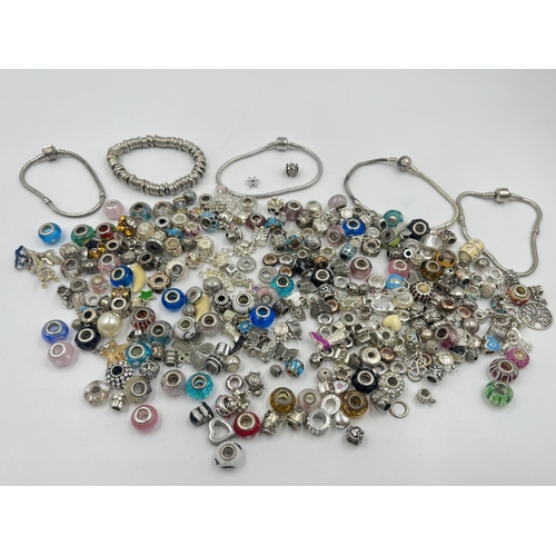 2038 - A collection of charms to include Pandora etc.