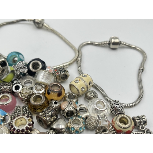 2038 - A collection of charms to include Pandora etc.