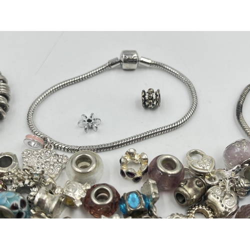 2038 - A collection of charms to include Pandora etc.