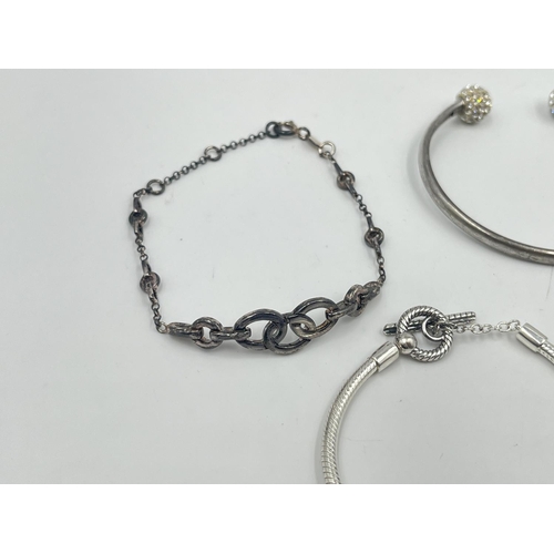 2040 - A collection of .925 silver bracelets to include Links of London, Pandora etc.