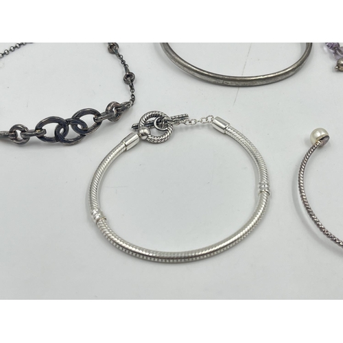 2040 - A collection of .925 silver bracelets to include Links of London, Pandora etc.