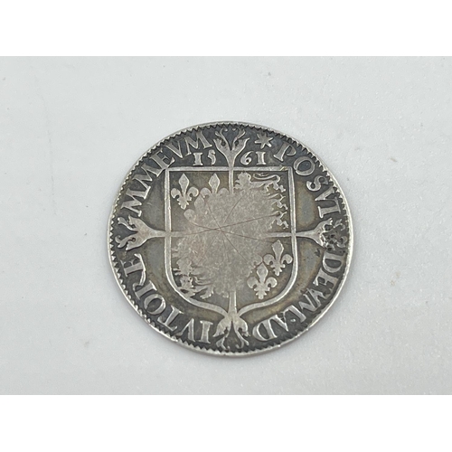 2212 - A 92.5% silver 1561 hammered sixpence