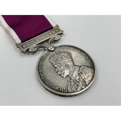 2315 - A George V Regular Army Long Service and Good Conduct Service medal presented to 1031810 Sjt. A. J. ... 