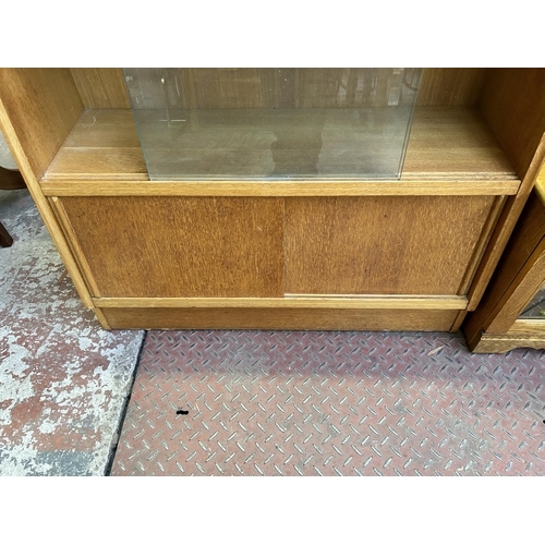 86 - A 1950s G Plan Brandon oak bookcase - approx. 87cm high x 91cm wide x 33cm deep