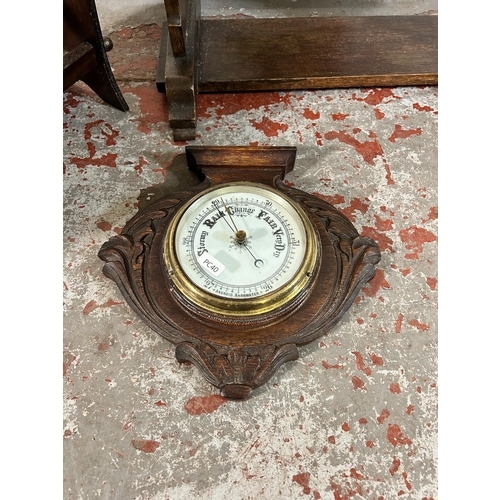 58 - Three items, one Edwardian carved oak wall hanging aneroid barometer, one oak drop leaf side table a... 