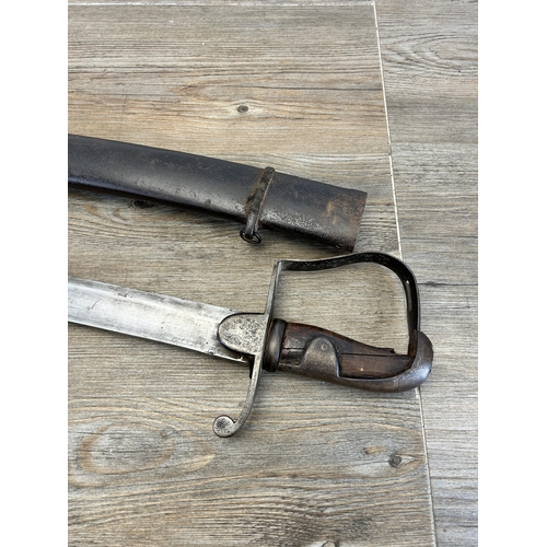 2320 - A 1796 pattern light cavalry sabre with metal scabbard - approx. 93cm long including handle