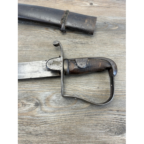 2320 - A 1796 pattern light cavalry sabre with metal scabbard - approx. 93cm long including handle