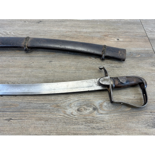 2320 - A 1796 pattern light cavalry sabre with metal scabbard - approx. 93cm long including handle