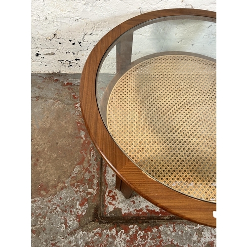 72 - A 1970s G Plan teak and cane circular two tier coffee table with glass top - approx. 44cm high x 82c... 