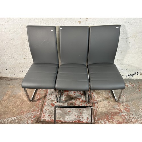 112 - Four modern grey faux leather and chrome plated cantilever dining chairs