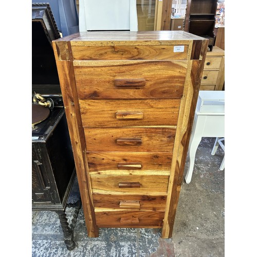 113 - An Indian sheesham wood chest of drawers - approx. 127cm high x 58cm wide x 45cm deep