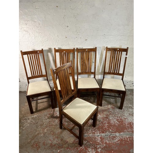 115 - Five Indian sheesham wood dining chairs