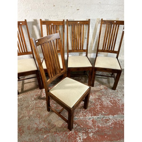 115 - Five Indian sheesham wood dining chairs