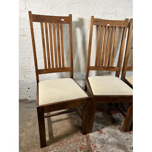 115 - Five Indian sheesham wood dining chairs