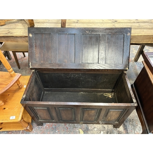 228 - An 18th century style oak panelled blanket box - approx. 53cm high x 91cm wide x 42cm deep