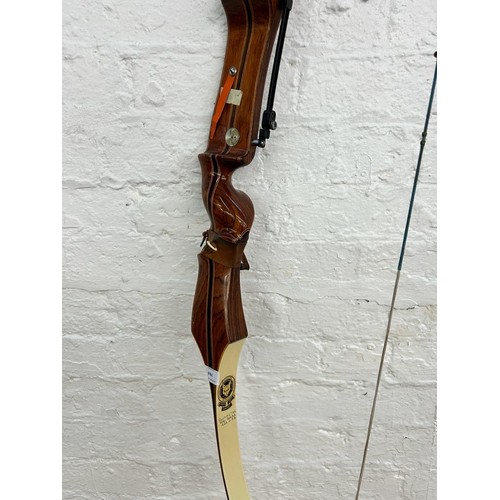 769 - A Marksman Archery Products Sherwood Forest Bowcraft longbow, marked Olympic.T.S.4. 66. 6682. 42 ½ a... 