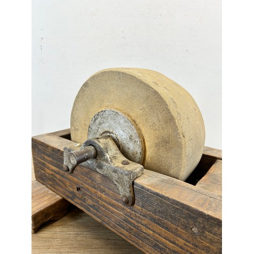 766 - An antique grinding stone