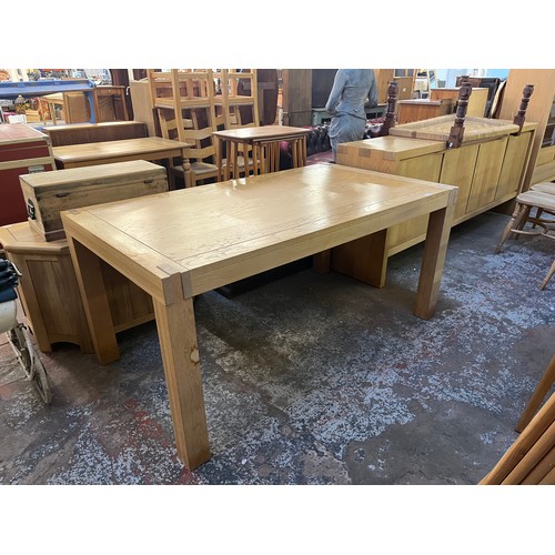 153 - A Scandinavian Karel Mintjens solid oak dining table - approx. 78cm high x 95cm wide x 170cm long