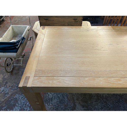 153 - A Scandinavian Karel Mintjens solid oak dining table - approx. 78cm high x 95cm wide x 170cm long