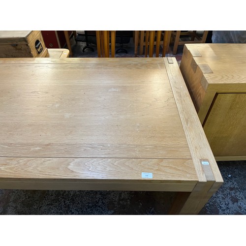 153 - A Scandinavian Karel Mintjens solid oak dining table - approx. 78cm high x 95cm wide x 170cm long