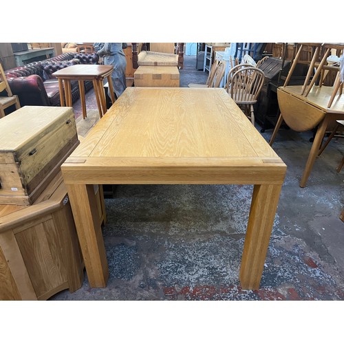 153 - A Scandinavian Karel Mintjens solid oak dining table - approx. 78cm high x 95cm wide x 170cm long