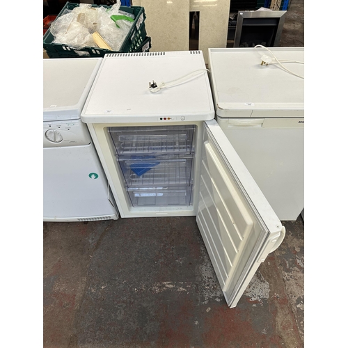 1067 - A Zanussi 55cm under counter freezer