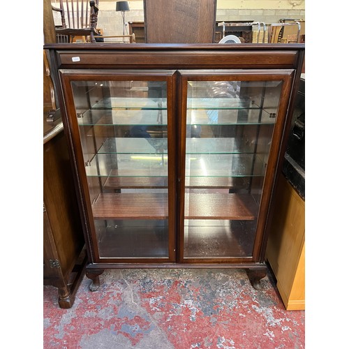 168 - A mahogany display cabinet on cabriole supports