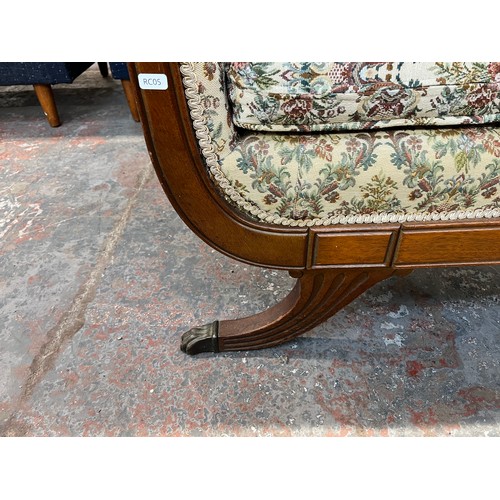 237 - A 19th century style carved mahogany and floral fabric upholstered three seater sofa - approx. 84cm ... 