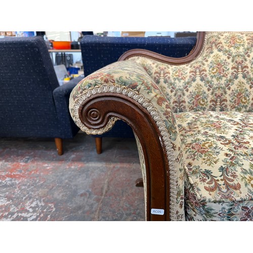 237 - A 19th century style carved mahogany and floral fabric upholstered three seater sofa - approx. 84cm ... 