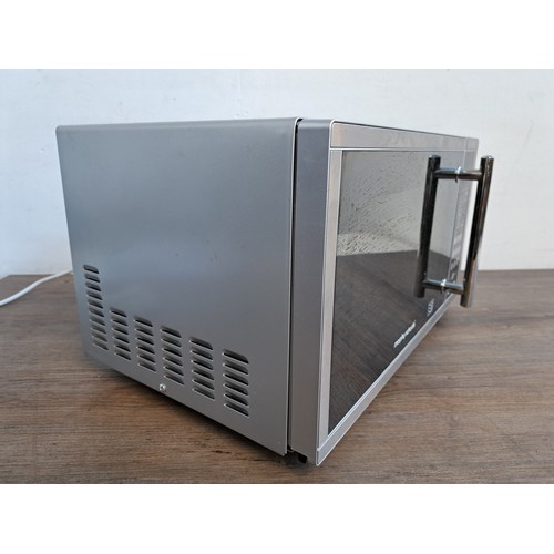 1050 - A Morphy Richards 900w microwave oven