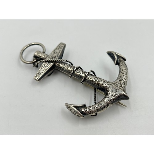 2051 - Two silver brooches, one Ward Bros. Scottish thistle and one anchor - approx. gross weight 18g