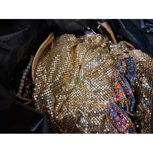 1207A - Two bags containing a large quantity of costume jewellery