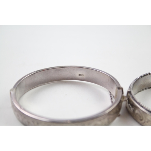 2330A - Two silver floral design bangles - approx. gross weight 39g