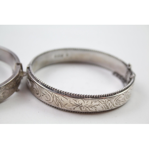 2330A - Two silver floral design bangles - approx. gross weight 39g