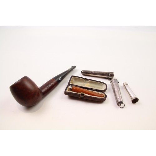 2377 - Five pieces of tobacciana, three .925 silver cheroot cases, one Chacom pipe and one cased amber and ... 