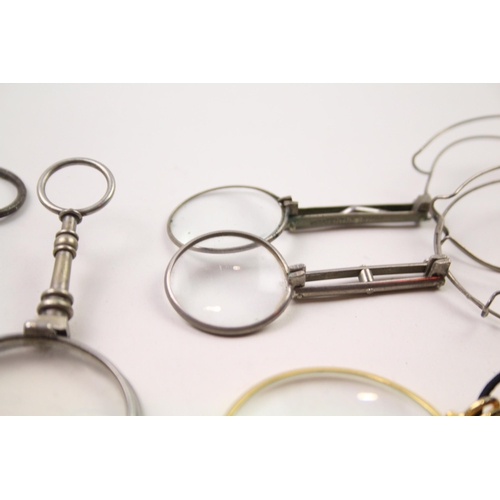 2381 - Five vintage optical instruments, two pairs of lorgnettes and three magnifiers