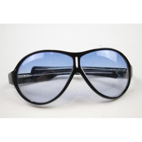 618 - A cased pair of Prada sunglasses