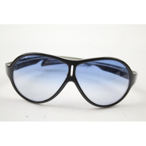 618 - A cased pair of Prada sunglasses