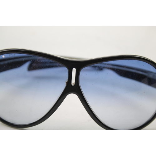 618 - A cased pair of Prada sunglasses