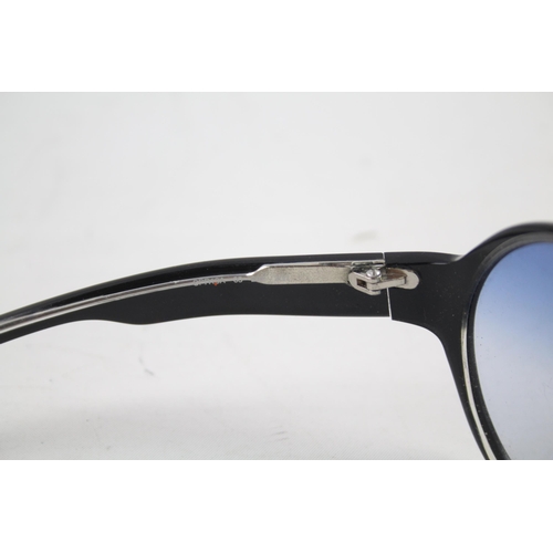 618 - A cased pair of Prada sunglasses