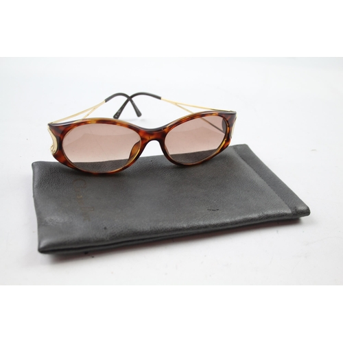 619 - A pair of cased Christian Dior sunglasses