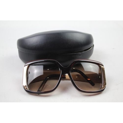 620 - A cased pair of Chopard sunglasses