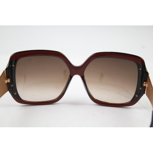 620 - A cased pair of Chopard sunglasses