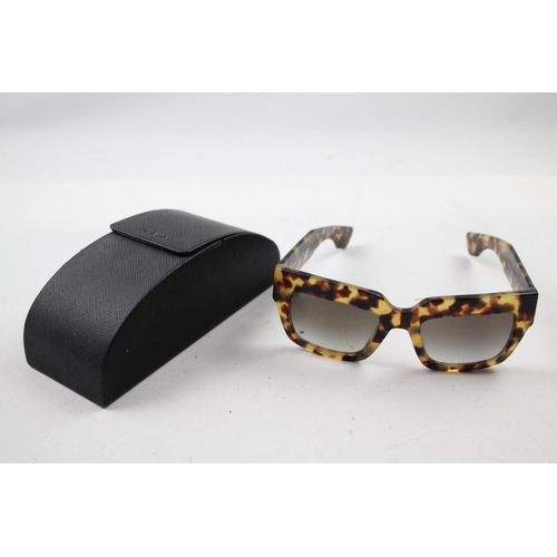 621 - A cased pair of Prada sunglasses