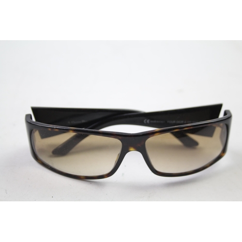 622 - A cased pair of Christian Dior sunglasses