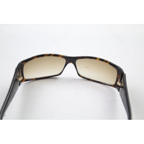 622 - A cased pair of Christian Dior sunglasses