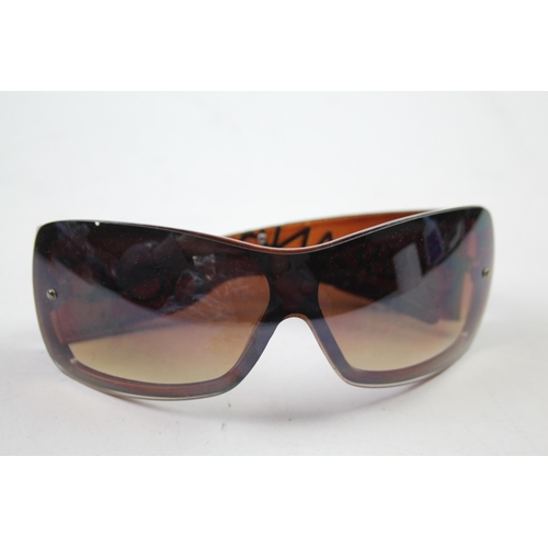 624 - A cased pair of D&G sunglasses